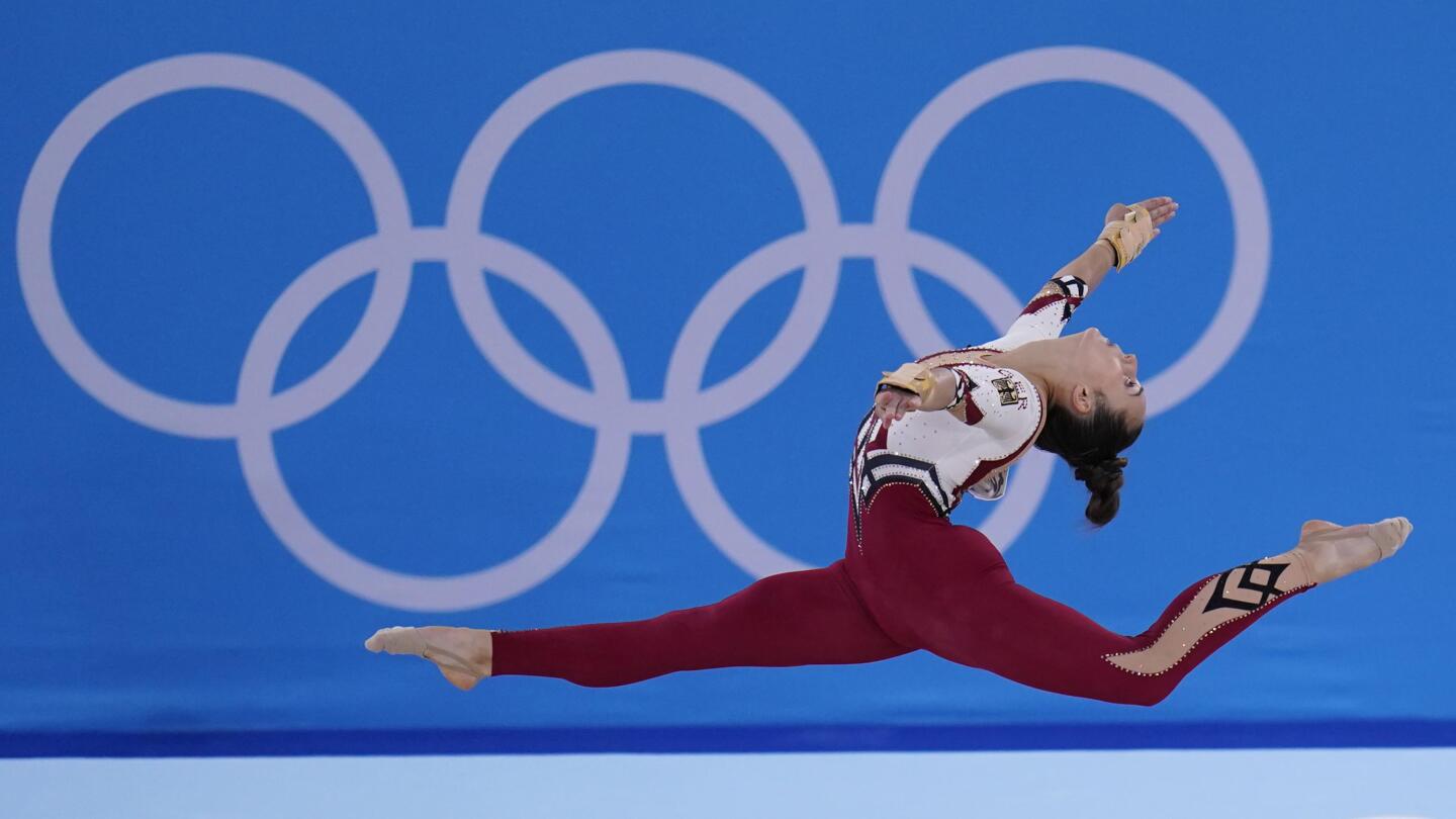 Gymnastics team, tired of 'sexualization,' wears unitards | AP News